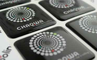 Domed sticker with dark Chaqwa logo