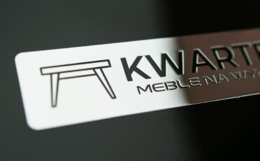 Chrome emblem for the furniture company
