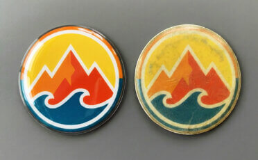 Yellowing of convex stickers in doming technology.